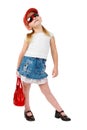 Fashion girl in sunglasses with red handbag Royalty Free Stock Photo