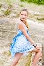 Fashion girl urbex location blue polka dress Royalty Free Stock Photo