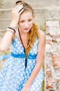 Fashion girl urbex location blue polka dress Royalty Free Stock Photo