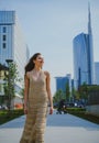 Fashion girl walking on streets. Walk on modern city street. City life. Woman in modern town. Street style vogue. Royalty Free Stock Photo