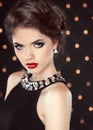 Fashion glamour elegant lady portrait with red lips and hairstyle over lights background. Attractive young woman. Cute girl. Royalty Free Stock Photo