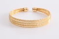 Fashion golden bracelet isolated on white background Royalty Free Stock Photo
