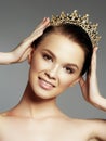 Fashion gorgeous woman in diamond crown, beauty contest winner. Luxury girl with bright makeup Royalty Free Stock Photo