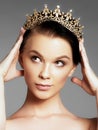Fashion gorgeous woman in diamond crown, beauty contest winner. Luxury girl with bright makeup Royalty Free Stock Photo