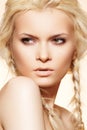 Fashion hairstyle, blond hair, braids & make-up Royalty Free Stock Photo