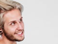Happy smiling blonde man with windblown hair Royalty Free Stock Photo