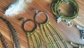 Fashion handmade jewelry photo olive green color with feathers and bull skull.