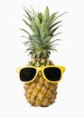 Fashion hipster pineapple, Bright summer color, Tropical fruit with sunglasses, Creative art concept, Minimal style Royalty Free Stock Photo