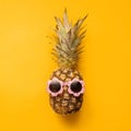 Fashion Hipster Pineapple in Sunglasses. Bright Summer Color. Tropical Fruit. Creative Art concept. Minimal style Hot Beach Party Royalty Free Stock Photo