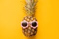 Fashion Hipster Pineapple in Sunglasses. Bright Summer Color. Tropical Fruit. Creative Art concept. Minimal style Hot Beach Party Royalty Free Stock Photo