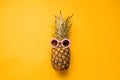 Fashion Hipster Pineapple in Sunglasses. Bright Summer Color. Tropical Fruit. Creative Art concept. Minimal style Hot Beach Party Royalty Free Stock Photo