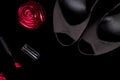 Fashion Lady Accessories Set. Black and pink. Minimal. Shoes, bracelet, perfume, lipstick and bag on black background. Flat lay. Royalty Free Stock Photo