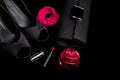 Fashion Lady Accessories Set. Black and pink. Minimal. Shoes, bracelet, perfume, lipstick and bag on black background. Flat lay. Royalty Free Stock Photo