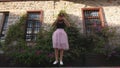 Fashion lifestyle portrait of young funny woman in tulle skirt