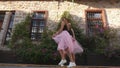 Fashion lifestyle two young women in tulle skirt funnily meet each other