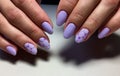 fashion lilac manicure with a shiny design