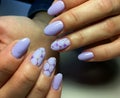 fashion lilac manicure with a shiny design