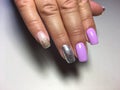 Fashion lilac manicure with silver design