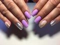 Fashion lilac manicure with silver design