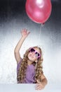 Fashion little girl red balloon heart sunglasses Royalty Free Stock Photo