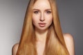 Fashion long hair. Beautiful blond girl. Healthy straight shiny hair style. Beauty woman model. Smooth hairstyle