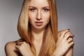 Fashion long hair. Beautiful blond girl,. Healthy straight shiny hair style. Beauty woman model. Smooth hairstyle Royalty Free Stock Photo