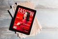 Fashion magazine cover on tablet