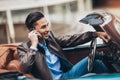 Fashion man sitting in luxury retro cabriolet car Royalty Free Stock Photo