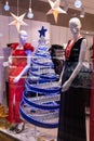 Fashion Mannequins Standing In shop. Christmas dress Clothing Shop In Shopping Royalty Free Stock Photo