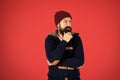 Fashion menswear shop. Masculine clothes concept. Think and decide. Winter menswear. Man bearded warm jumper and hat red