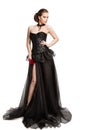 Fashion Model in Black Corset Dress holding Red Rose Flower, Beautiful Woman in Long Gown, White