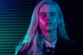 Fashion model blonde woman in colorful bright neon lights Royalty Free Stock Photo