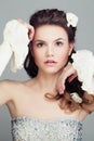 Fashion Model with Bridal Hairstyle. Beautiful Hair and Flowers Royalty Free Stock Photo