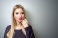 Fashion model with bright make-up. Portrait of young fashion woman with long blond hair Royalty Free Stock Photo