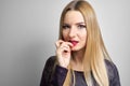 Fashion model with bright makeup. Portrait of young fashion woman with long blond hair Royalty Free Stock Photo