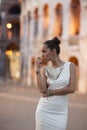 Fashion model with coloseum in background. Rome, Italy Royalty Free Stock Photo