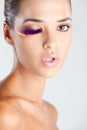 Fashion model with fake eyelashes made of feather glittery lips pout look Royalty Free Stock Photo