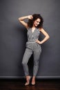 Fashion Model girl full length portrait isolated on gray background. Beauty stylish brunette woman posing in fashionable Royalty Free Stock Photo