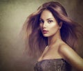 Fashion model girl with long blowing hair Royalty Free Stock Photo