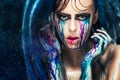 Fashion model girl portrait with colorful paint make up. woman bright color makeup. Closeup of vogue style lady face, Art des Royalty Free Stock Photo