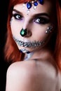 Fashion model with halloween skull makeup with glitter and rhinestones Royalty Free Stock Photo