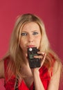 Fashion model holding a Light meter Royalty Free Stock Photo