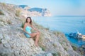 Fashion model in lace dress outside posing ,yahts on background Royalty Free Stock Photo