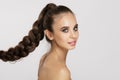 Fashion model with long natural hair , hairstyle braid