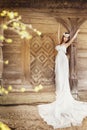 Fashion Model Long White Dress, Folk Country Style, Heathen Wedding Bride Beauty Portrait, old wooden house