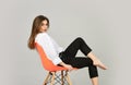 Fashion model looking casual. Stay home. Summer makeup. Girl sit on chair. Girl with natural makeup. Woman sensual look Royalty Free Stock Photo