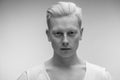 Fashion model male on white. Handsome albino guy closeup. Royalty Free Stock Photo