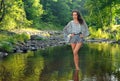 Fashion model posing pretty at the nature location Royalty Free Stock Photo