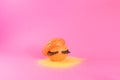 Fashion model pumpkin Halloween with slime hair pink background