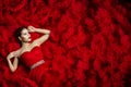Fashion Model on Red Dress Background, Woman Beauty Portrait Royalty Free Stock Photo